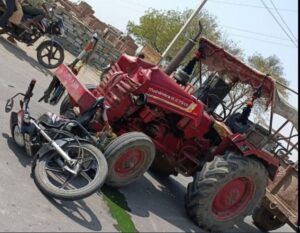 tractor bike accident